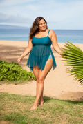 Woman wearing a teal 3in1 Adjustable Strap Tankini Swim Top | Final Sale on a sunny beach showcasing size-inclusive swimwear and a comfortable fit.