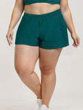 Classic Fit Swim Shorts With Panty | Plus Size in teal on a curvy model showcasing modest size inclusive swimwear with a comfortable supportive fit