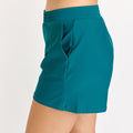 Side view of dark jade Classic Fit Swim Shorts With Panty | Final Sale, featuring a comfortable fit, supportive and modest swimwear style, size-inclusive design, swimwear designed for every body.