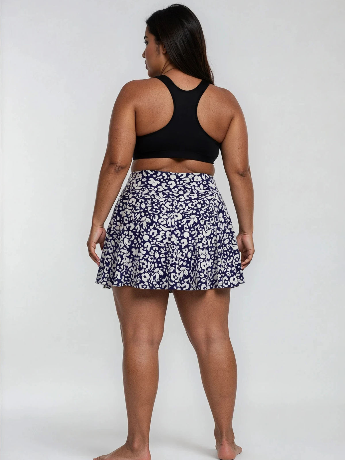 Flowy Swim Skort With Shorts | Plus Size in navy floral print with black swim top for modest supportive swimwear and a comfortable fit