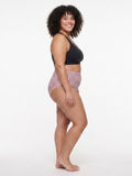 A smiling model wears High Waisted Full Coverage Bikini Bottom | Plus Size with a striped design and black bikini top for comfortable supportive swimwear for every body