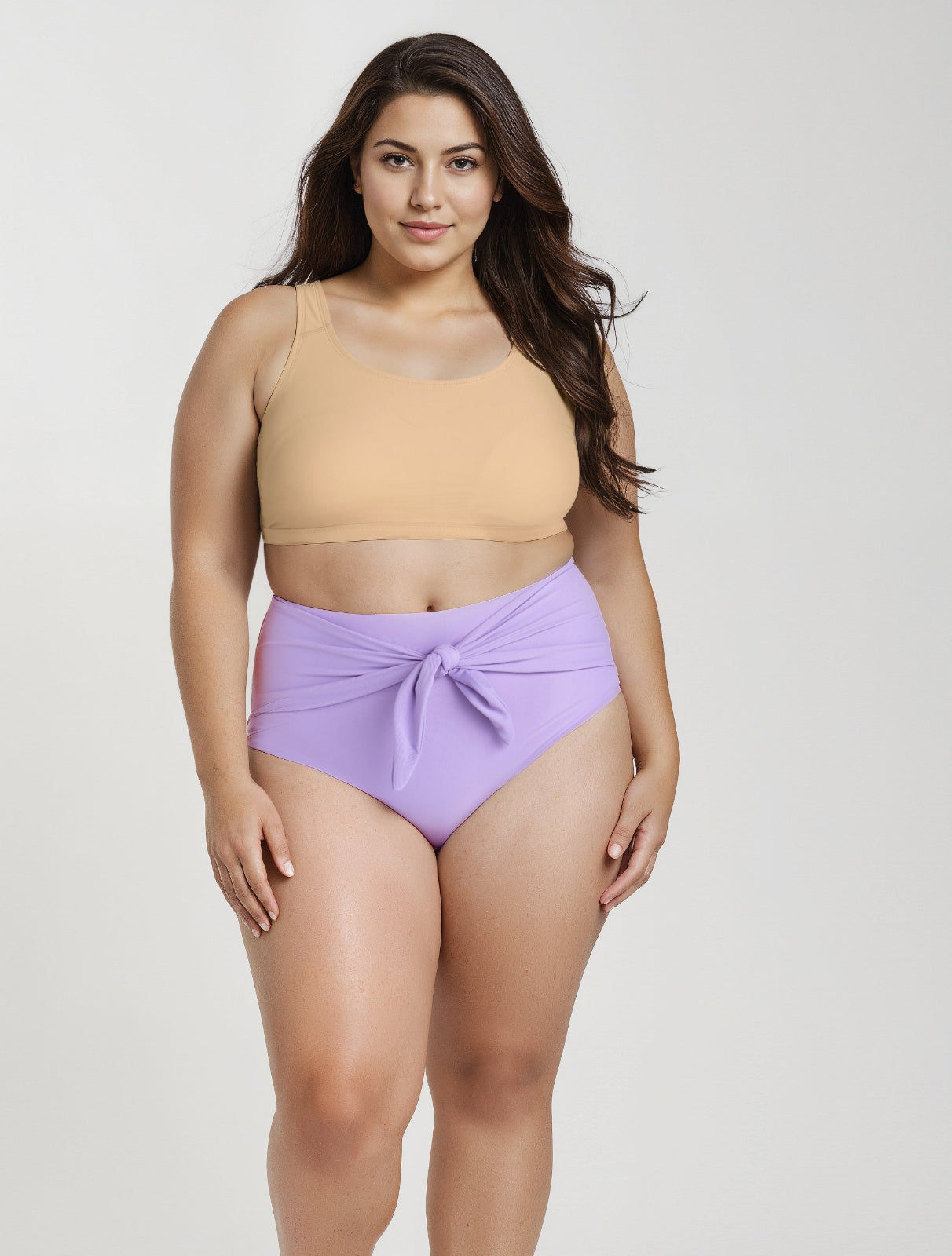 High Waisted Bikini Bottom With Front Tie | Last Call shown on a model in lavender with a flattering high-waisted fit and front tie. Size-inclusive swimwear designed for every body.