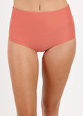 Coral high-waisted bikini bottom on a plain background