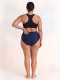 High Waisted Full Coverage Bikini Bottom | Plus Size shown from the back on a model with a black swim top for supportive comfortable fit and modest size-inclusive swimwear