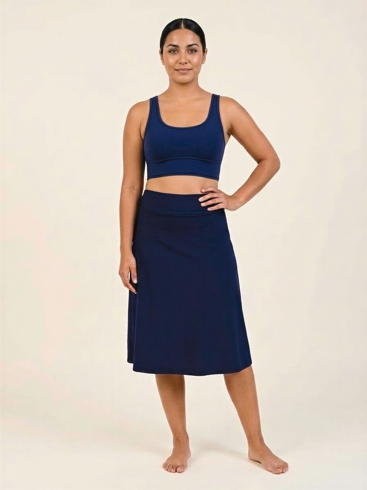 Long Swim Skort With Capri Leggings in navy shown as modest supportive swimwear with a comfortable fit designed for every body