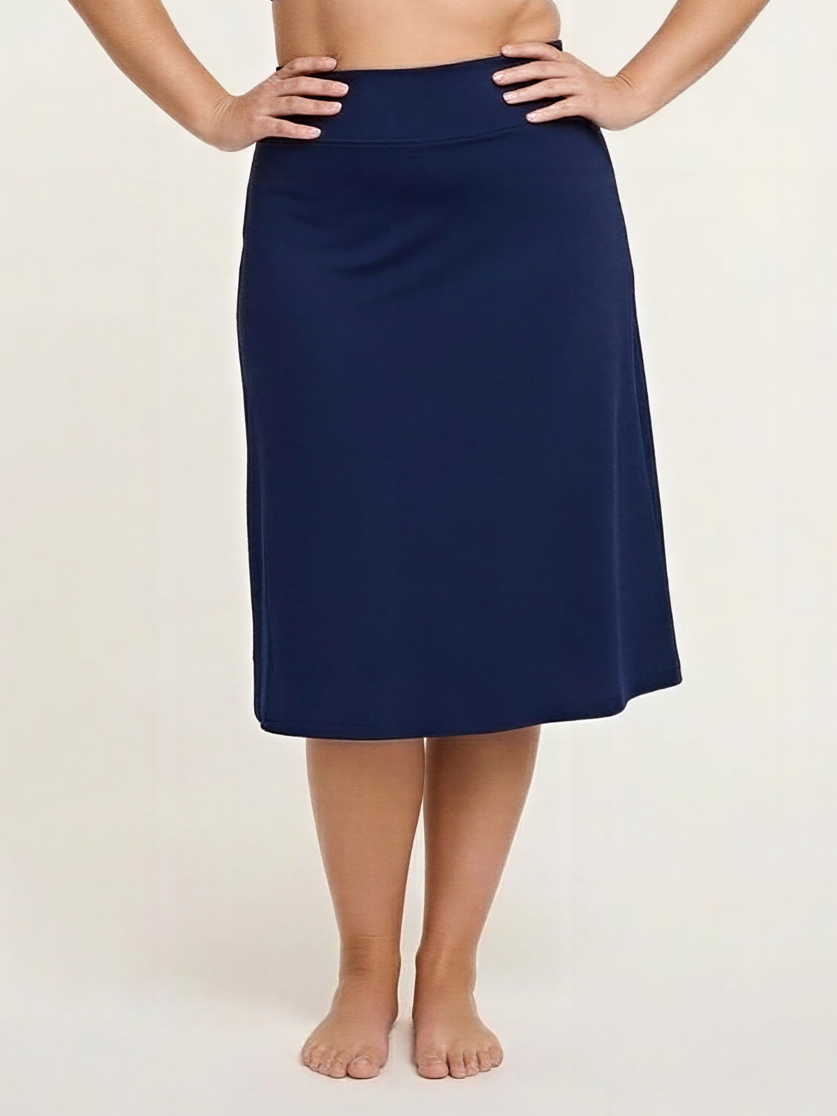 Navy Long Swim Skort With Capri Leggings | Plus Size shown on a model as modest size inclusive swimwear with a comfortable fit