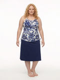 Long Swim Skort With Capri Leggings | Plus Size in navy with a floral swim top for modest supportive swimwear designed for every body