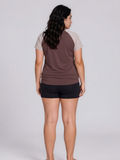 Loose Fit Adele Swim Top | Plus Size shown from the back on a model in a brown modest design with striped sleeves and a comfortable fit.