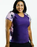 Woman wearing a purple top with floral sleeves on a white background