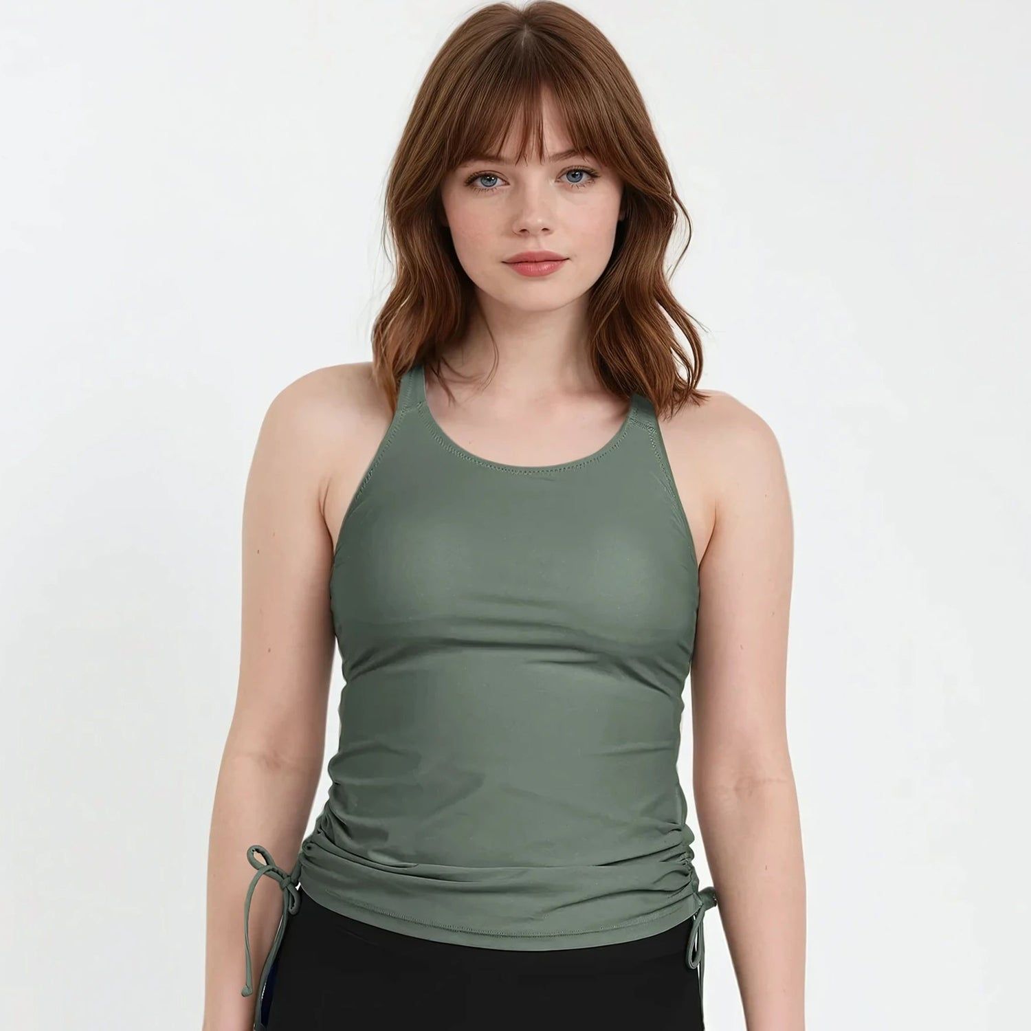 Maya Tankini Swim Top With Built-in Bra in olive green modeled with black swim bottoms for supportive comfortable size-inclusive swimwear designed for every body