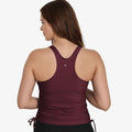 Maya Tankini Swim Top With Built-in Bra in burgundy shown from the back on a model featuring racerback styling and side ties for supportive comfortable swimwear