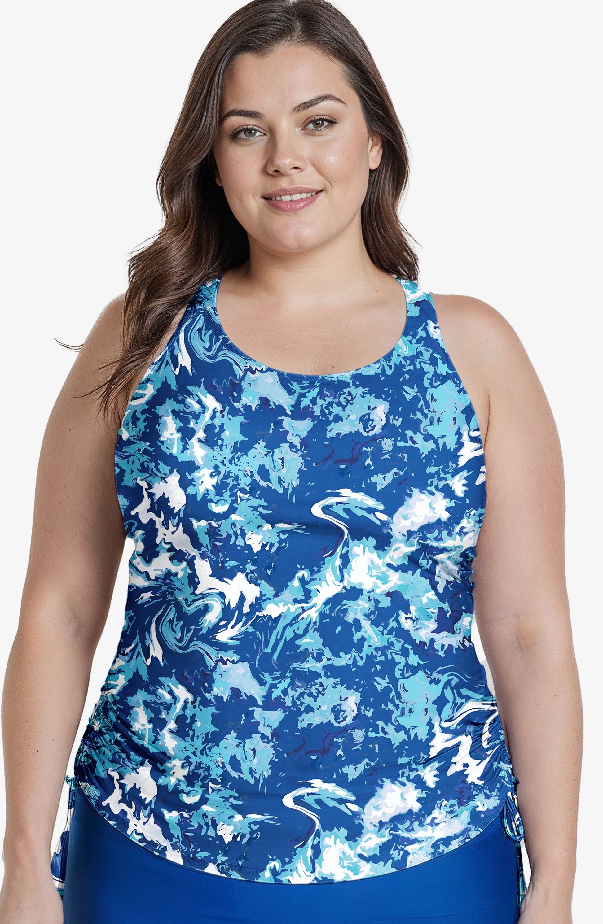 Woman wearing a blue and white patterned tank top on a white background