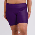 Mid-Thigh Swim Shorts | Final Sale in deep purple, shown on a model with a supportive, comfortable fit for size-inclusive, modest swimwear designed for every body.