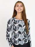 Nora Swim Top | Final Sale shown on a smiling woman in a modest long sleeve black and white print supportive comfortable size-inclusive swimwear for every body