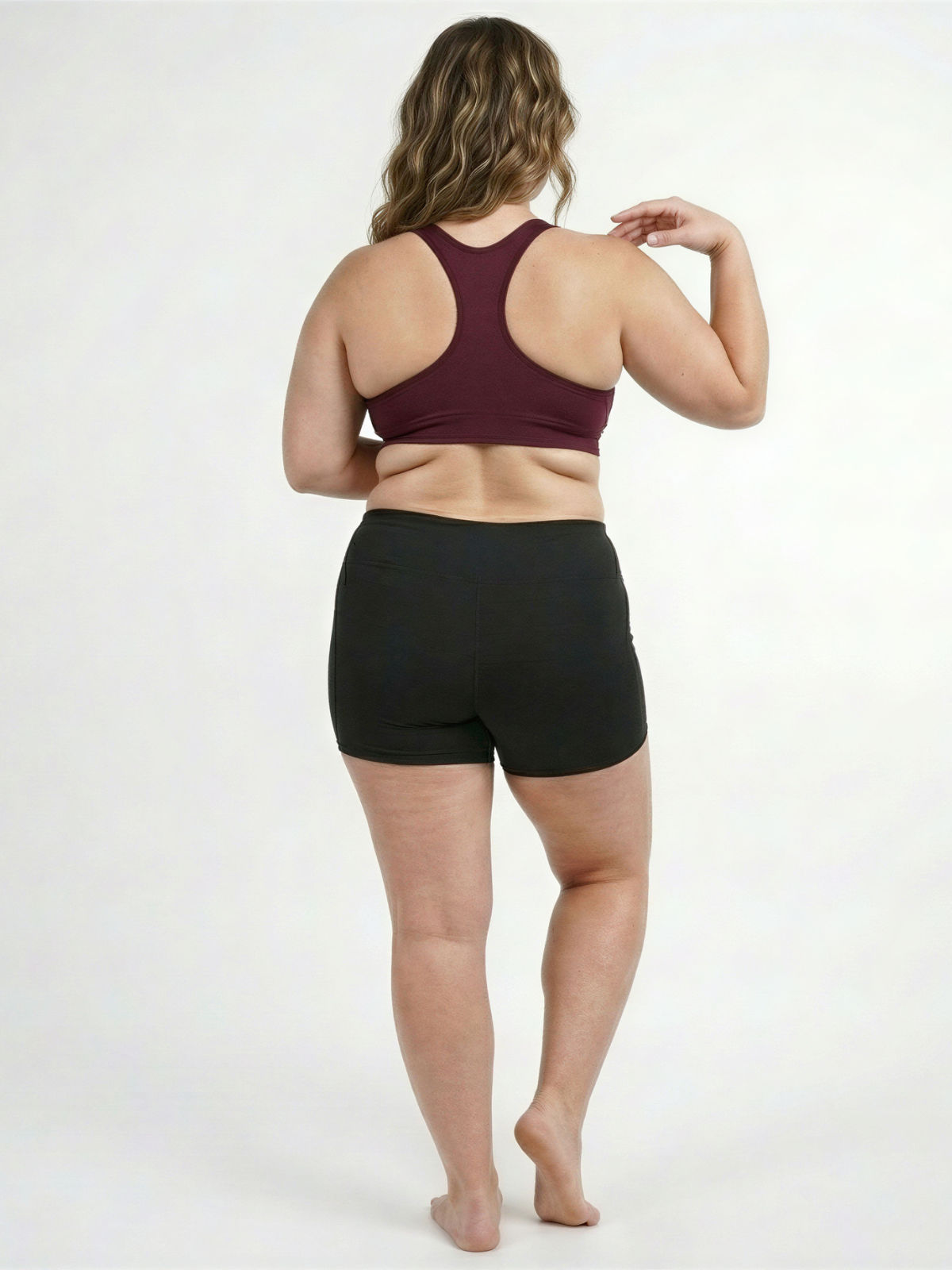Racerback Swim Bra | Plus Size shown from the back on a model, featuring a burgundy racerback design with supportive coverage for comfortable, size-inclusive swimwear.