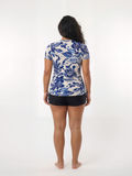 Short Sleeve Adele Swim Top | Plus Size shown from the back in blue floral swimwear with a modest supportive comfortable fit designed for every body