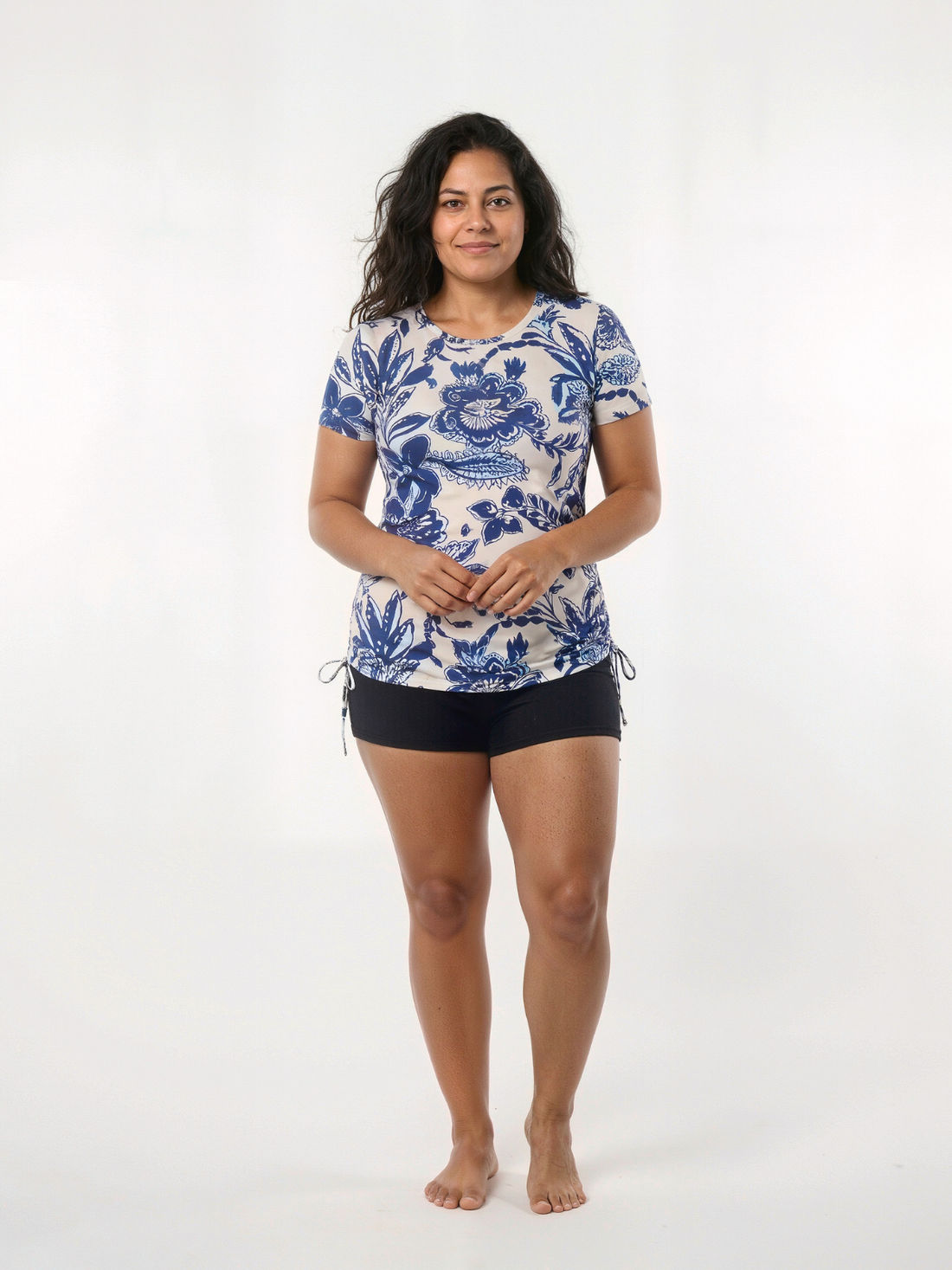 Short Sleeve Adele Swim Top | Plus Size in blue and white floral print modeled with black swim bottoms for size-inclusive supportive and comfortable swimwear for every body