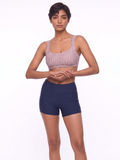 Sienna Swim Bra striped supportive swimwear top modeled with navy swim shorts for a comfortable fit and swimwear designed for every body