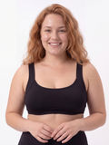 Sienna Swim Bra | Plus Size worn by a smiling woman, showing its supportive, modest design and comfortable fit for size-inclusive swimwear.