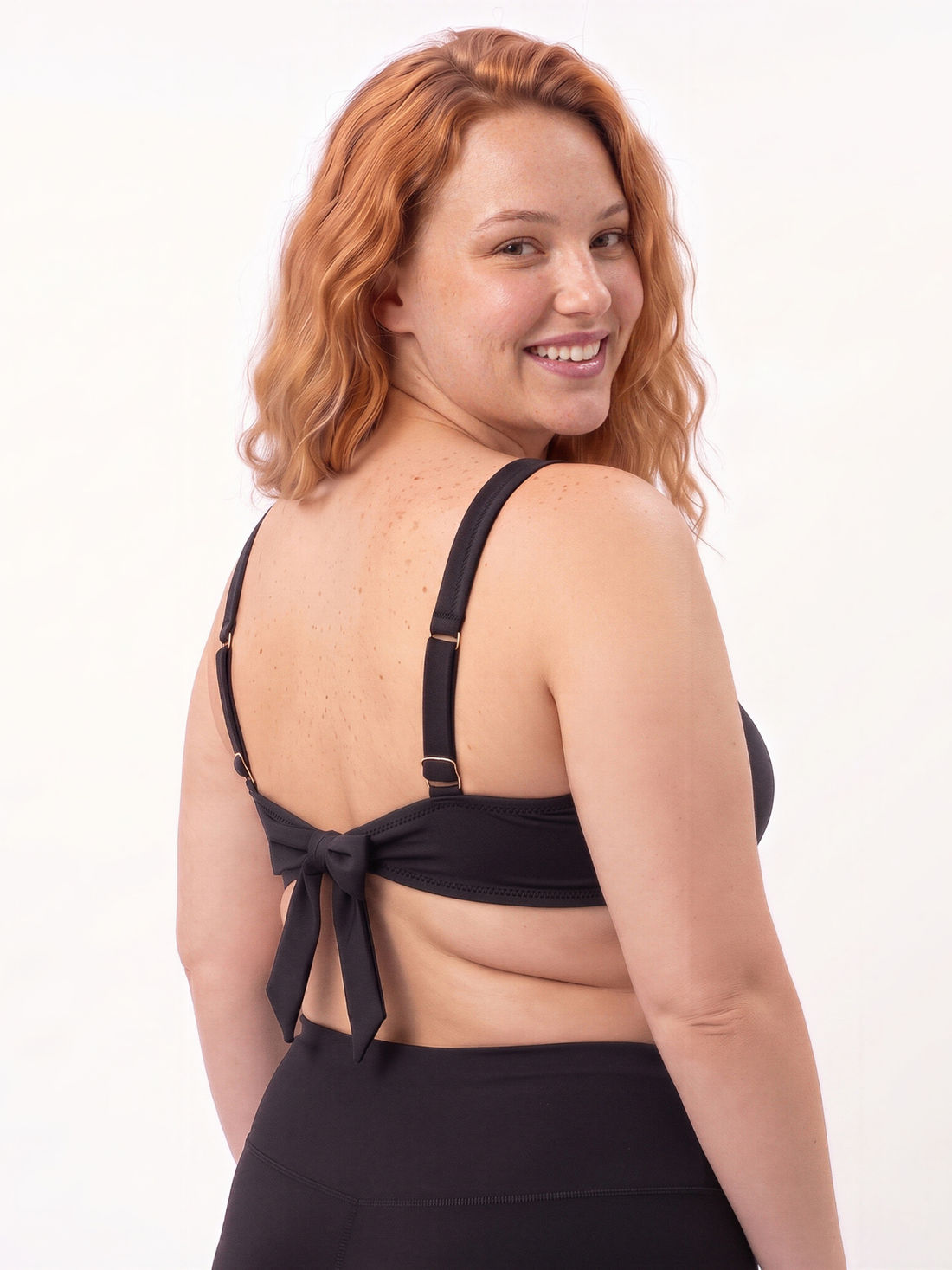 Sienna Swim Bra | Plus Size supportive swim top modeled by a smiling woman for comfortable size inclusive swimwear designed for every body