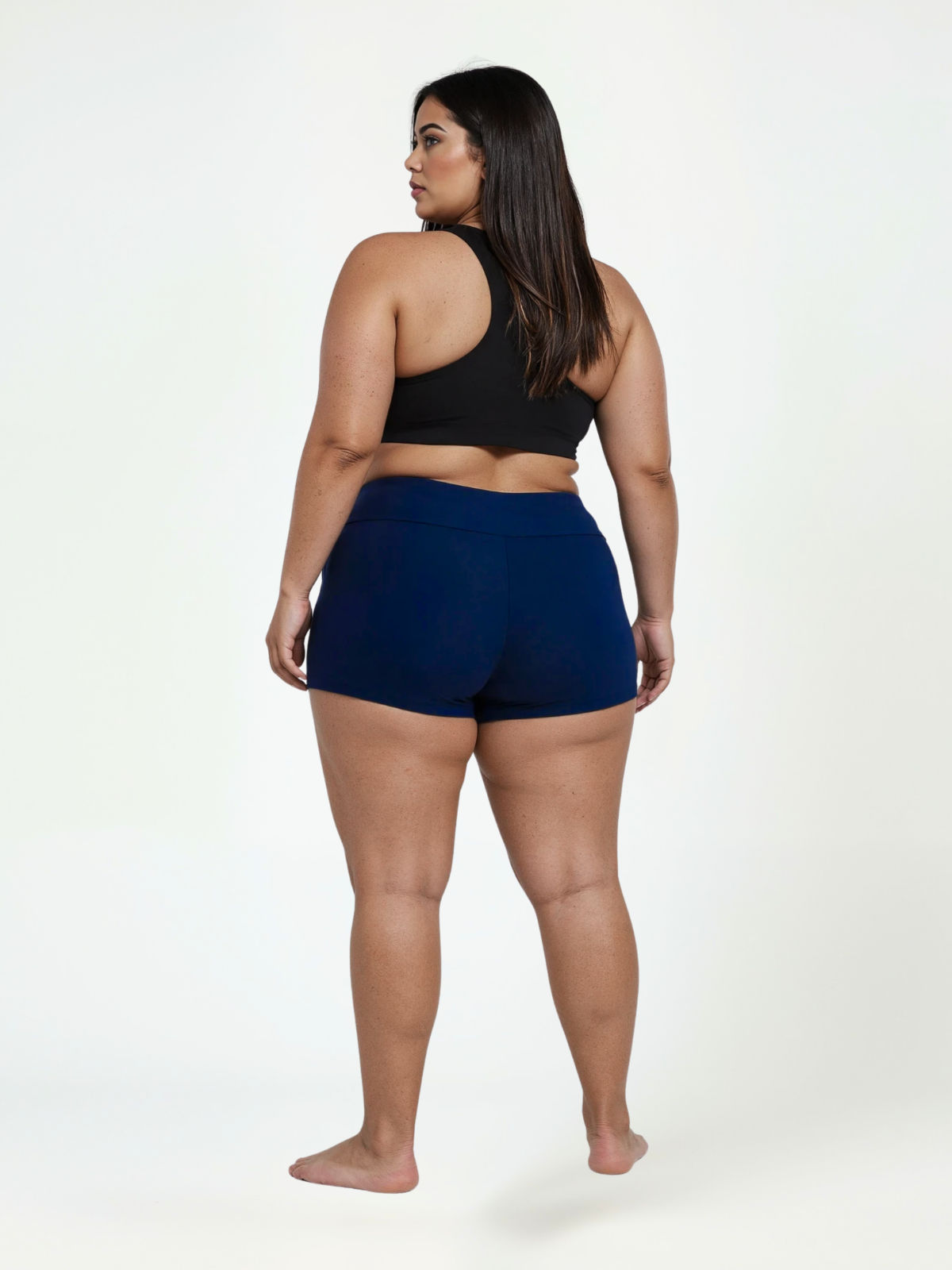 Swim Shorts | Plus Size in navy shown from the back on a curvy model with a comfortable fit for size-inclusive modest swimwear designed for every body
