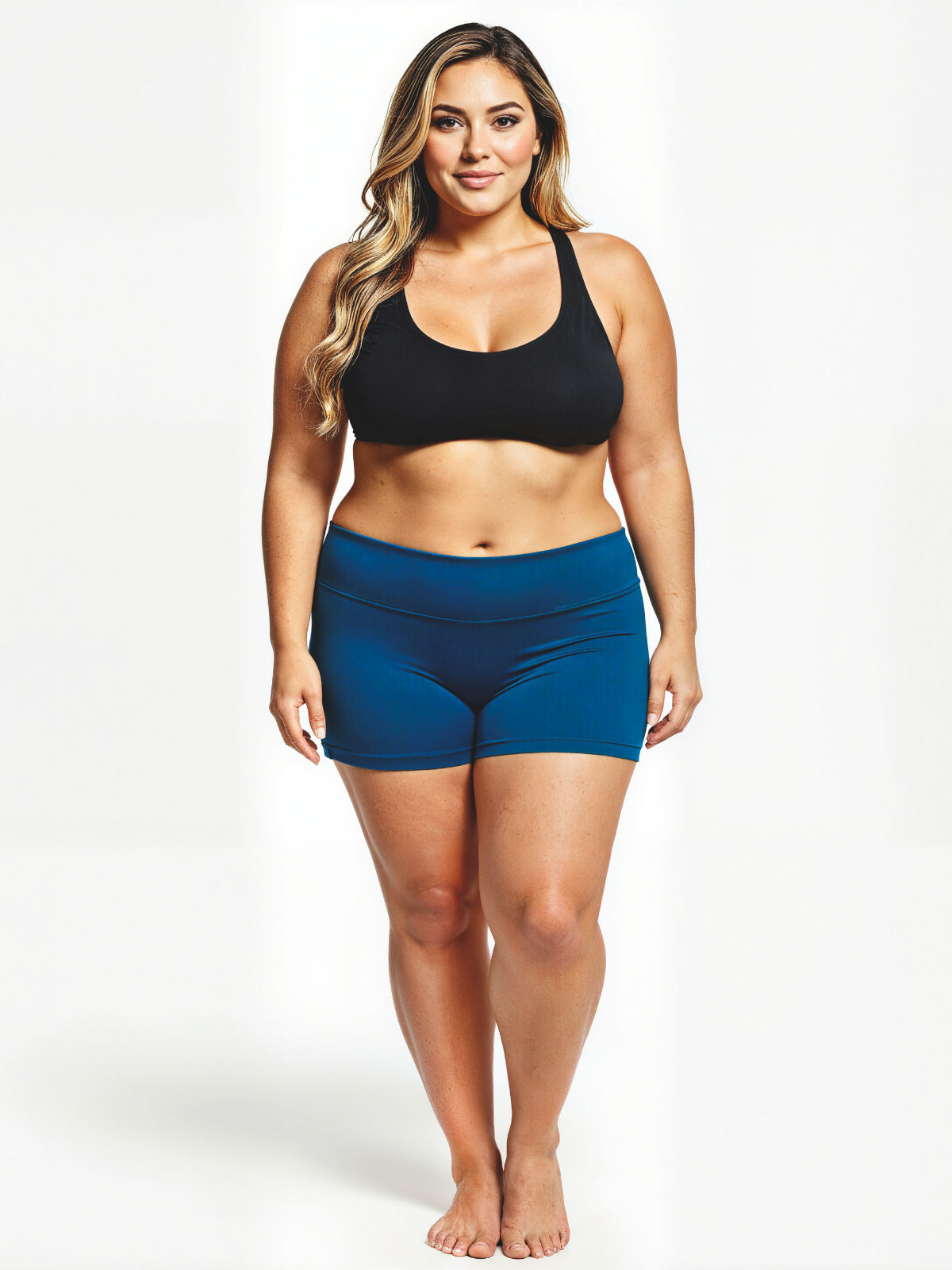 Swim Shorts | Plus Size in blue worn by a curvy model with a black swim top for modest size inclusive swimwear designed for every body