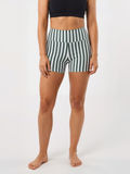 Swim Shorts with green and white vertical stripes and a high waisted fit modeled with a cropped black top for comfortable swimwear for every body