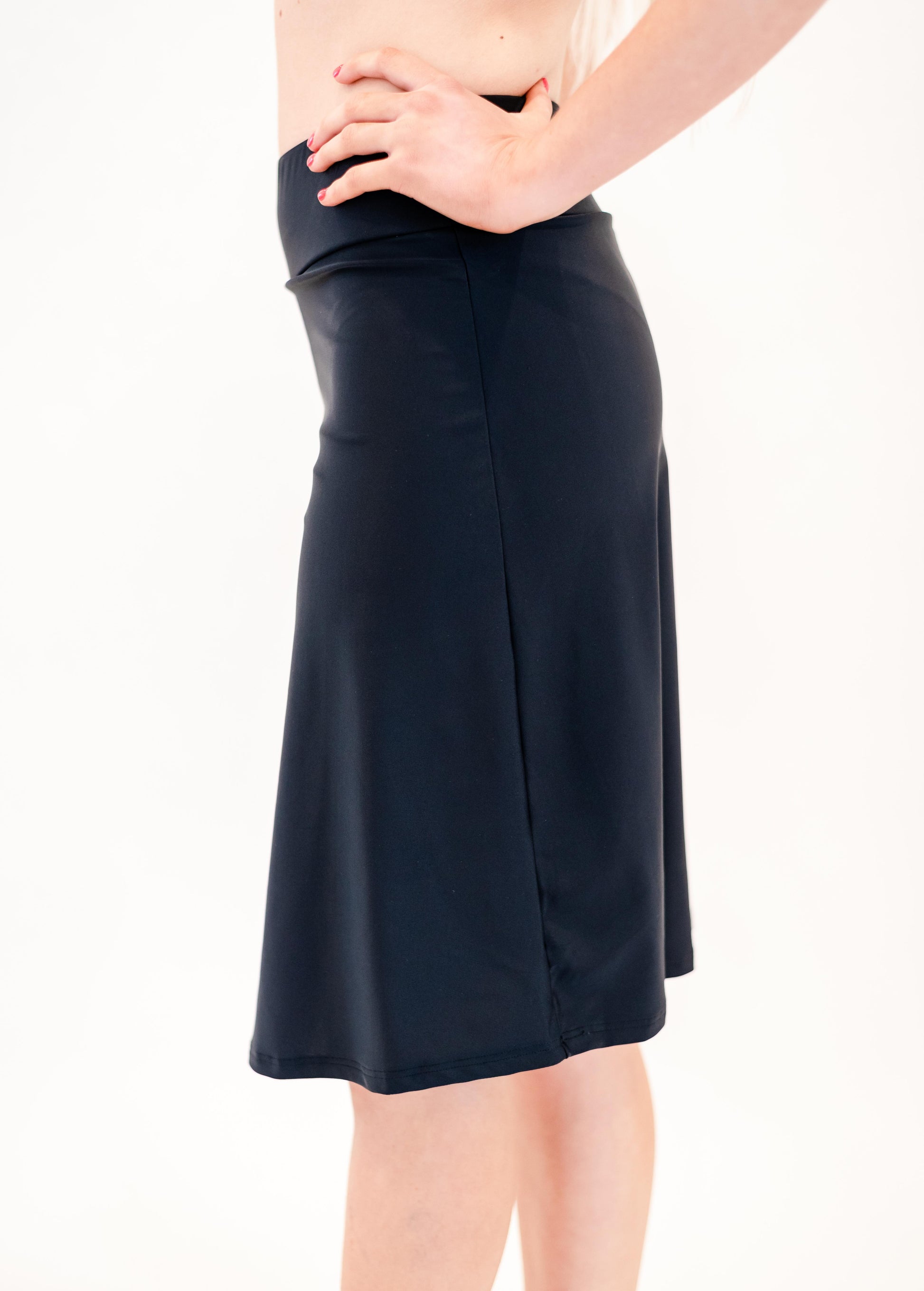 Knee length swim skort. Modest plus size skirt and pants. Womens' modest plus size swim skirt. Excellent sun protection UPF +50