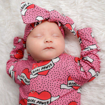 Girl power pink babygrow with matching bow heaband. Made in Cornwall by Lottie & Lysh