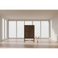 Solid mango wood Eldridge tall cupboard cabinet by Chocolate Wood in honey brown, with shelves and cabinet doors.