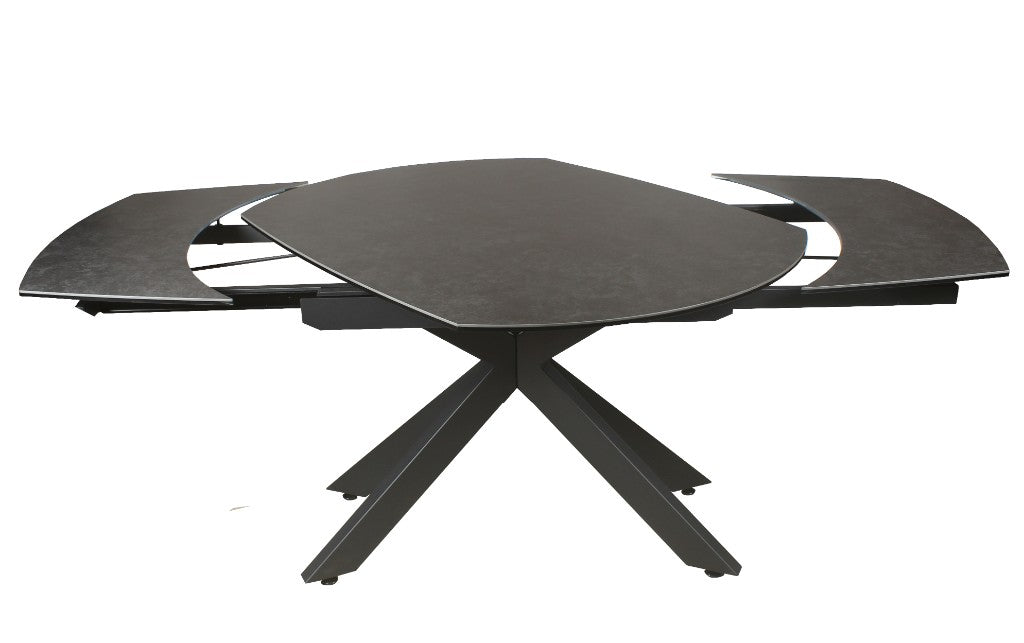 Dark grey SKIPSEA Swivel Extension ceramic glass dining table by MyChocolateWood, showing the table's adjustable length and sleek surface.
