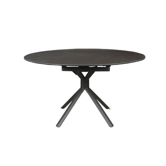 Dark grey Skipsea swivel extension ceramic glass dining table by MyChocolateWood, shown extended from 90cm to 135cm width.