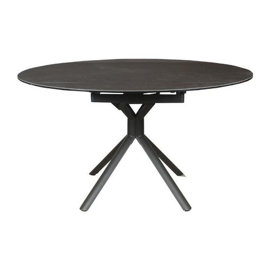 Dark grey Skipsea swivel extension ceramic glass dining table by Chocolate Wood, shown extended from 90cm to 135cm width.