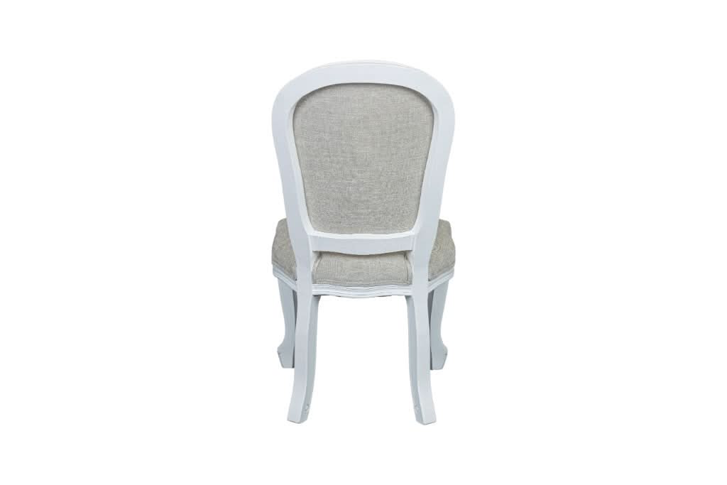 Sherborne white rubberwood dining chair by MyChocolateWood, showcasing a sleek design with a white finish and sturdy wooden frame.