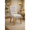 Chocolate Wood Murdoch solid oak linen dining chair showing a padded linen seat and sturdy wooden frame.