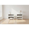 Pair of white MOUS nightstands or lamp tables by Chocolate Wood, featuring a sleek modern design with wood finish and storage drawers.