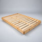 Malanya Solid Pine Bed with Curved Edges & Floating Legs — Made to Order