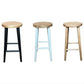 Three rustic-style bar stools with round natural wood seats and legs, shown side by side in black, pale blue, and natural wood finishes on a white background.