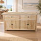 A light natural wood sideboard cabinet with two drawers on top, two lower doors, and black metal knobs, shown in a bright dining room setting.