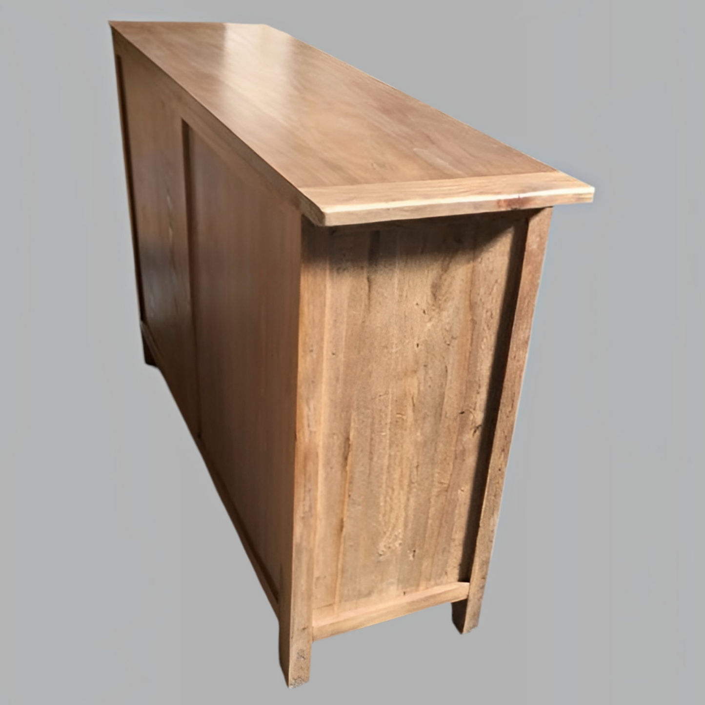 A rustic wooden sideboard or console table with a natural light brown finish, shown from a three-quarters perspective against a solid gray background.