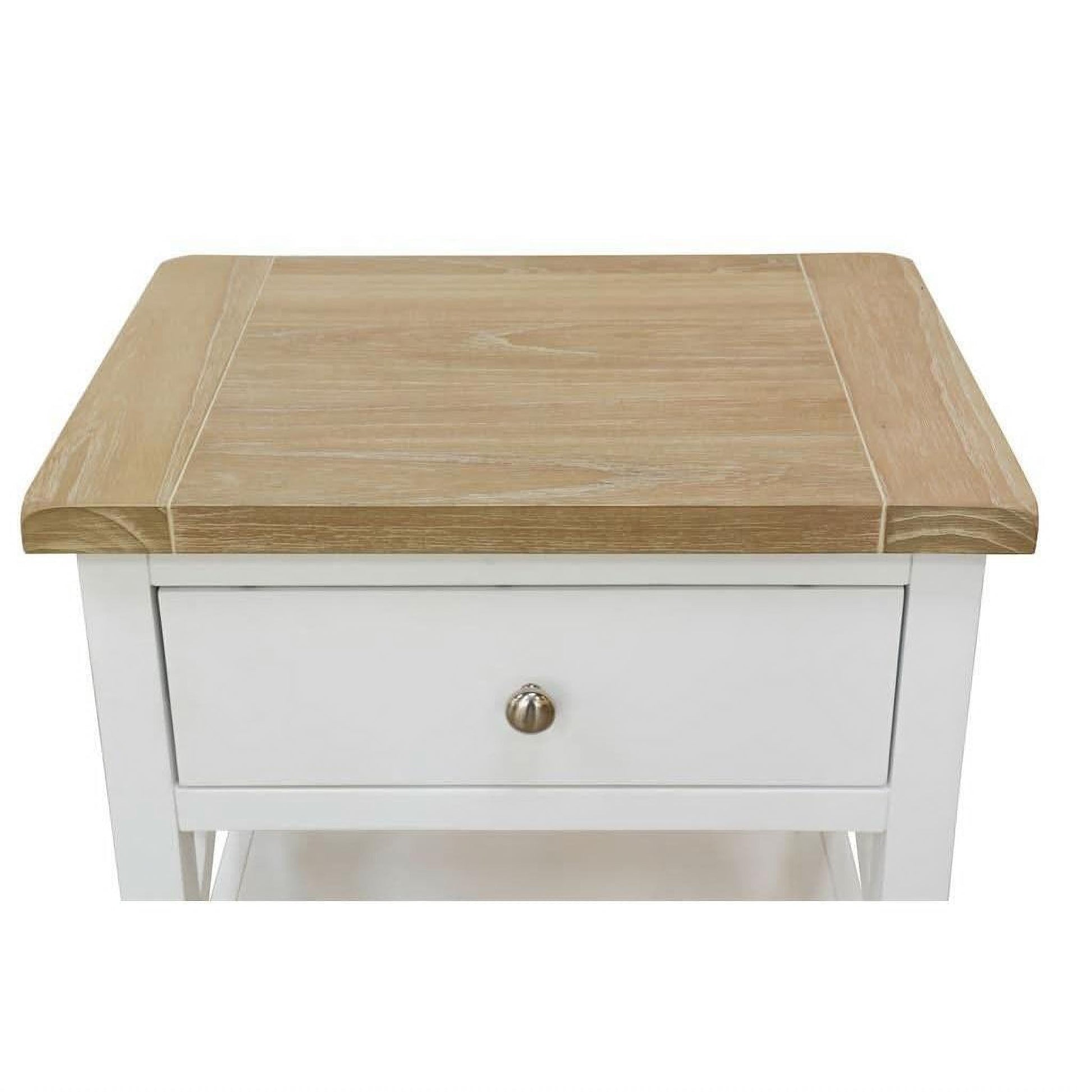 A small white nightstand or end table with a light natural wood top, featuring a single drawer with a round metallic knob and an open shelf below, shown on a plain white background.