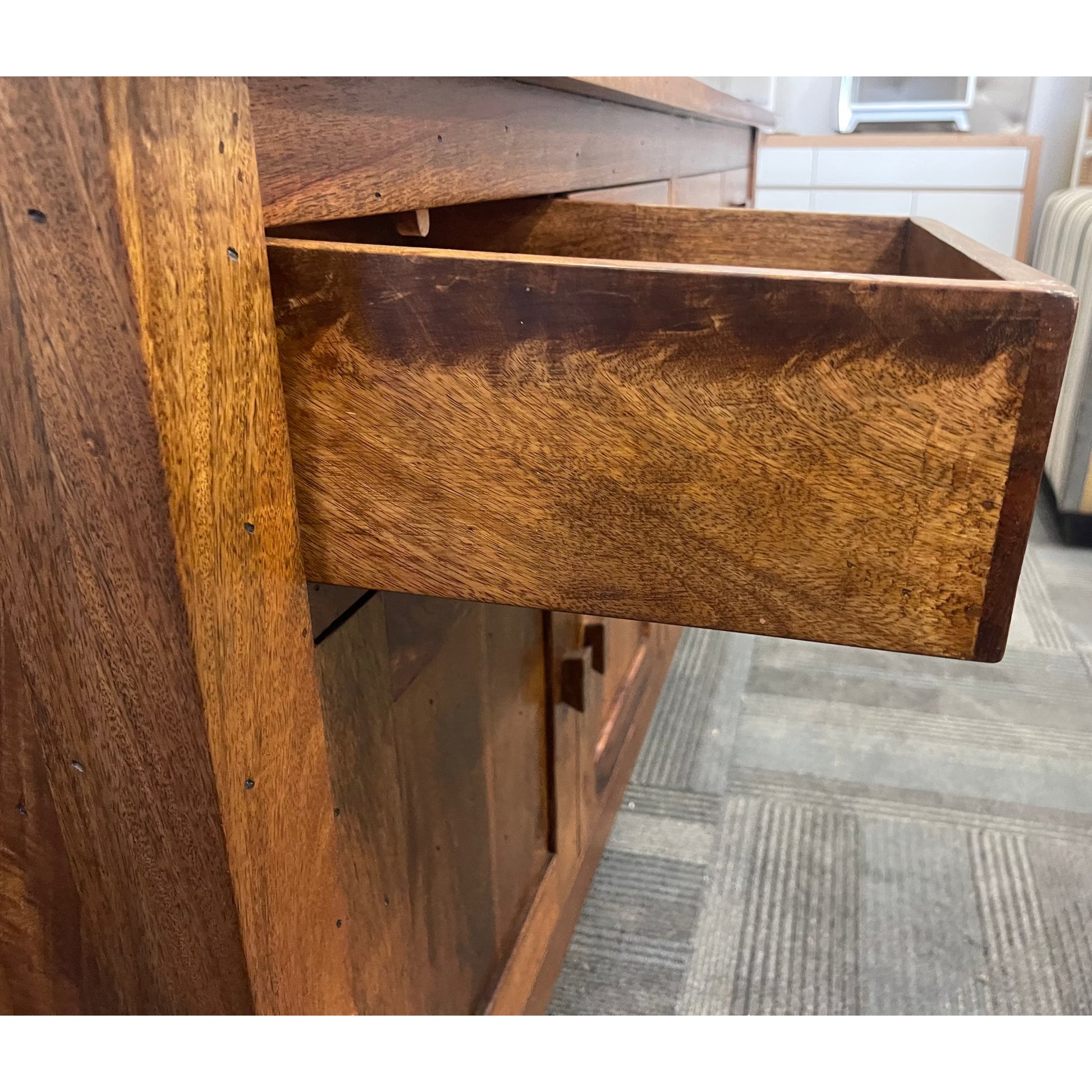 Solid Benato Indian Rosewood buffet with four doors and four drawers, featuring intricate wood grain details.