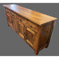 Solid Benato Indian Rosewood buffet with four doors and four drawers, showcasing a polished finish and intricate wood grain.