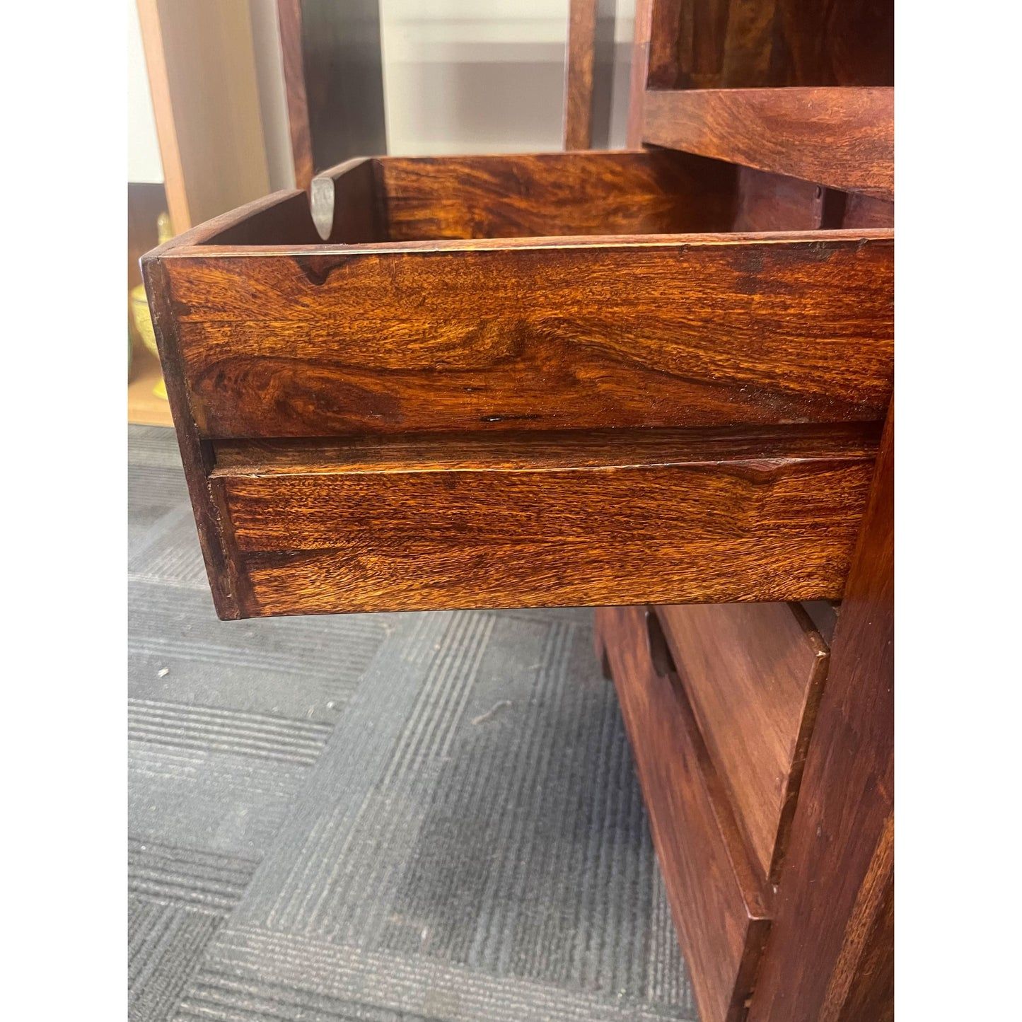 Solid Benato Indian Rosewood bookcase with three drawers and three shelves, showcasing rich wood grain and craftsmanship.