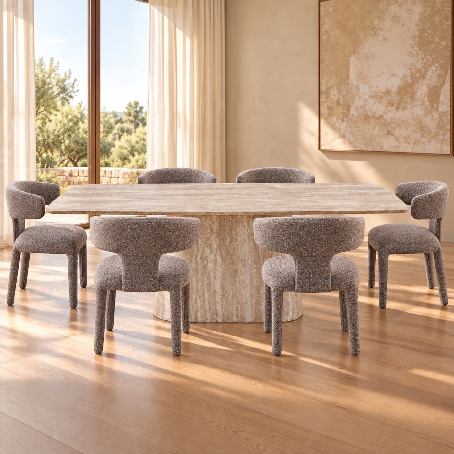 A modern dining set featuring a rectangular light stone table and six upholstered dining chairs in a warm, sunlit room with beige walls and wood flooring.