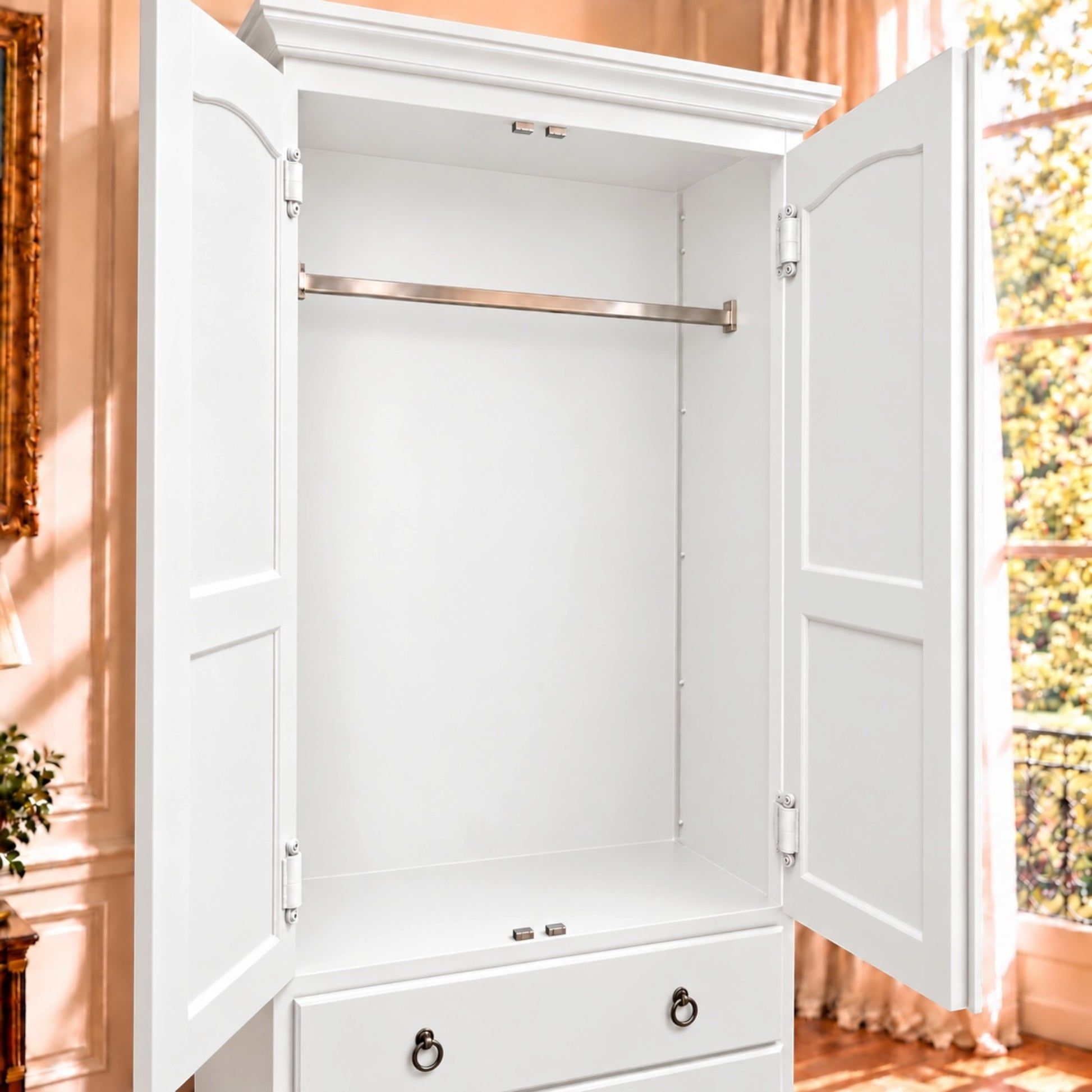 A white double-door wardrobe or armoire with both doors open, showing a metal hanging rod and interior shelving, set in a warm-toned room with a window and curtains.