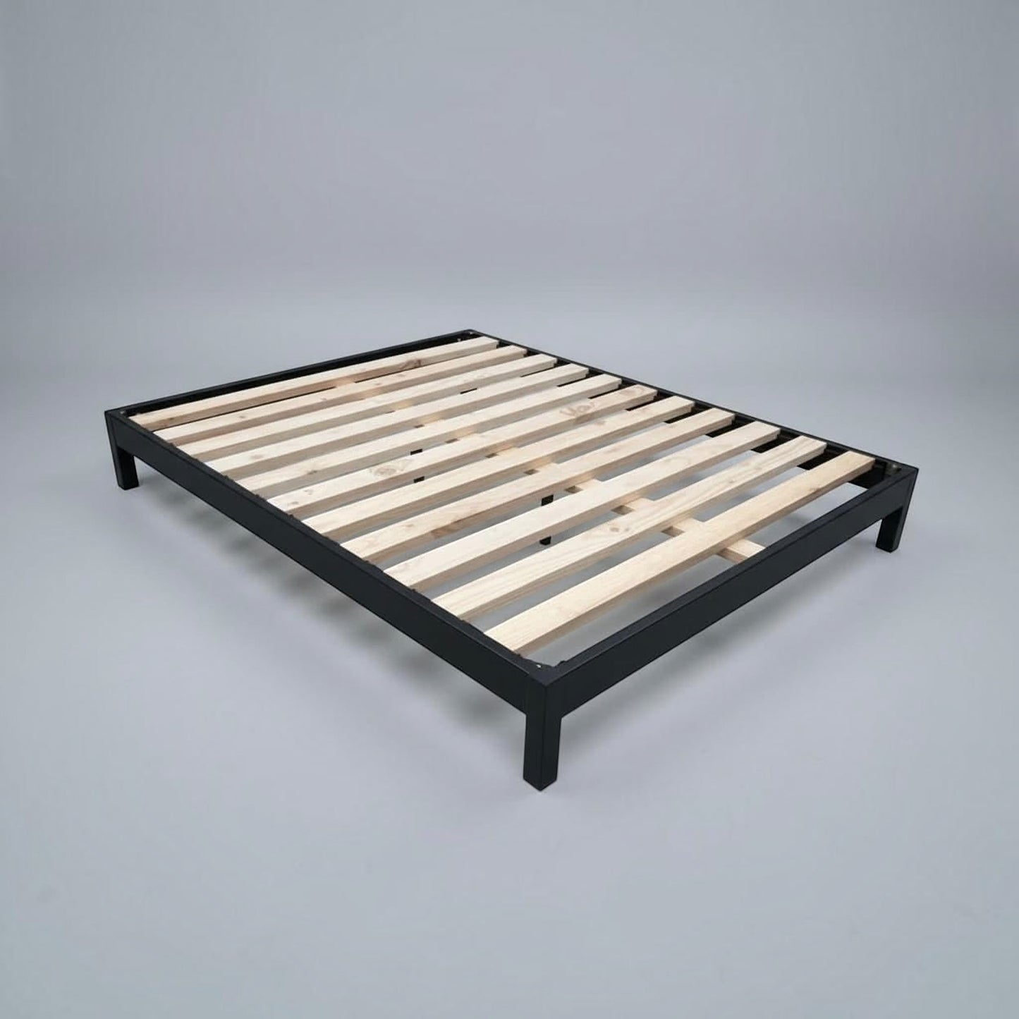 A modern platform solid vic ash frame with a matte black metal frame and natural wood slats, shown on a neutral gray studio background.