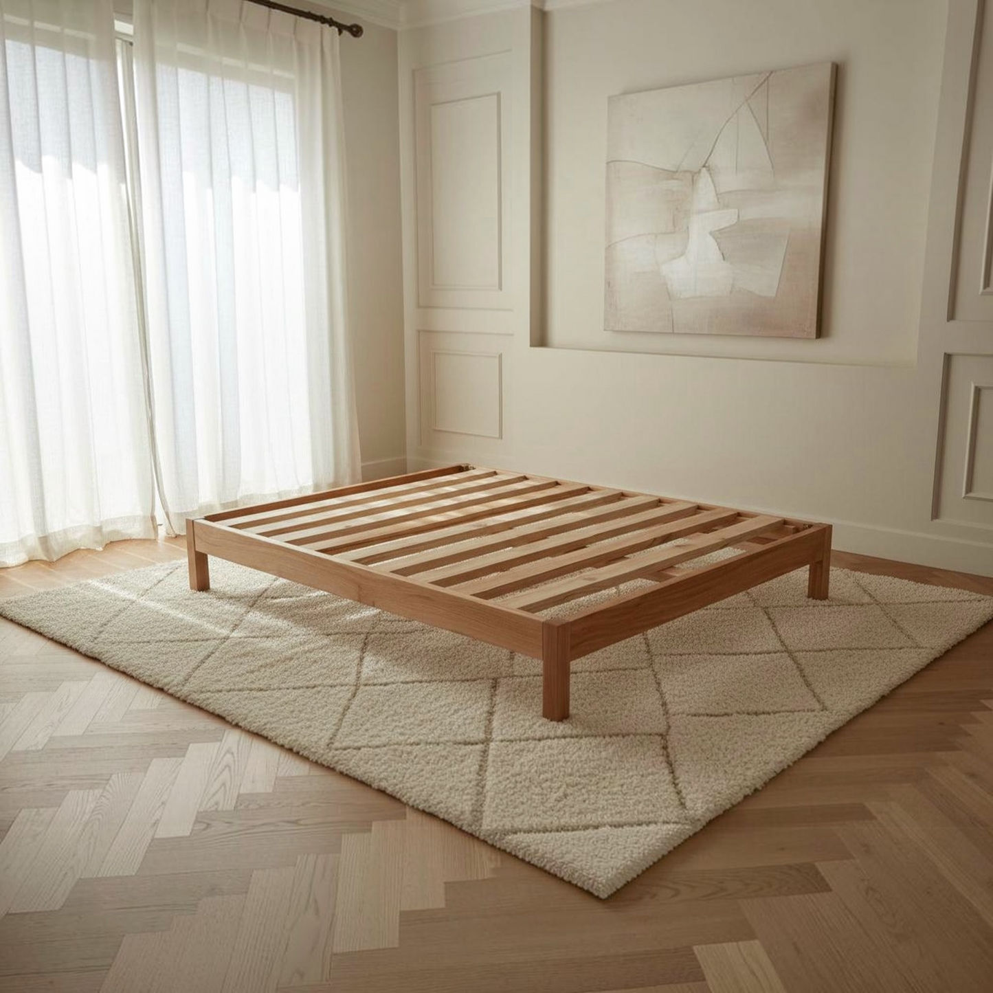A light natural wood platform bed frame with slatted support bars, shown in a bright, modern bedroom setting on a cream-colored textured rug over a light wood herringbone floor.