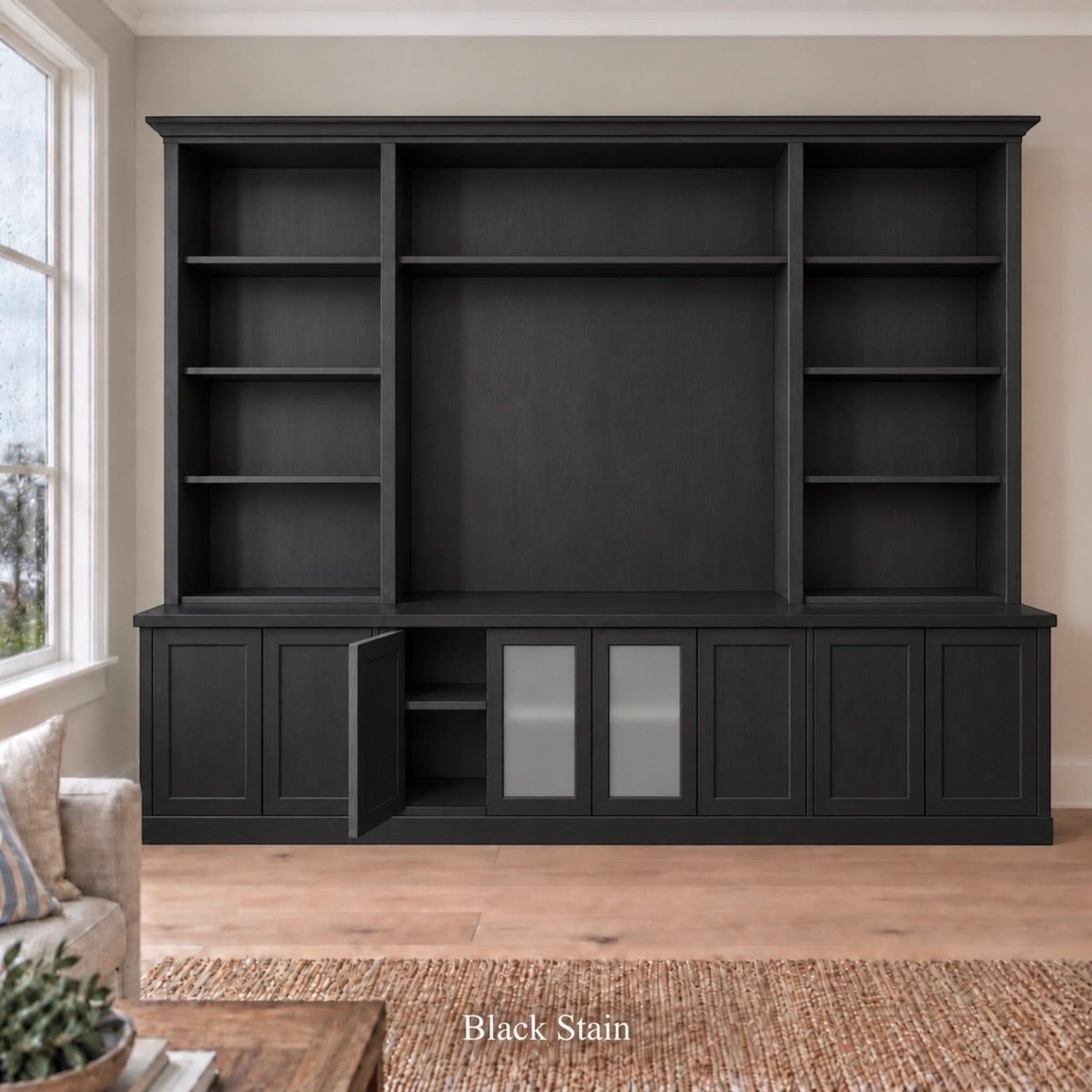 Harrington 5-piece wall unit in Black Stain with a buffet door open to show interior storage, frosted glass centre doors