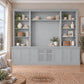 Harrington 5-piece wall unit in Dulux Grey Pail, styled with books, vases and plants, front view with frosted glass centre doors